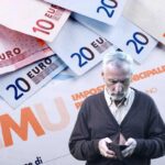 banconote euro e cartella imu con uomo che controlla portafogli vuoto