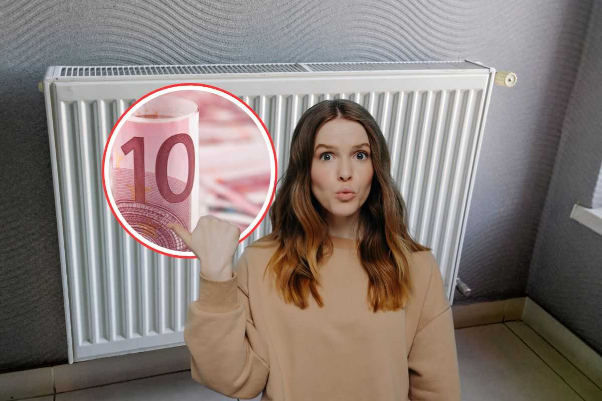 donna che indica una banconota da 10 euro e termosifone come sfondo