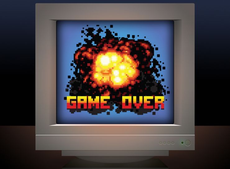 schermo di un vecchio videogioco con scritta game over